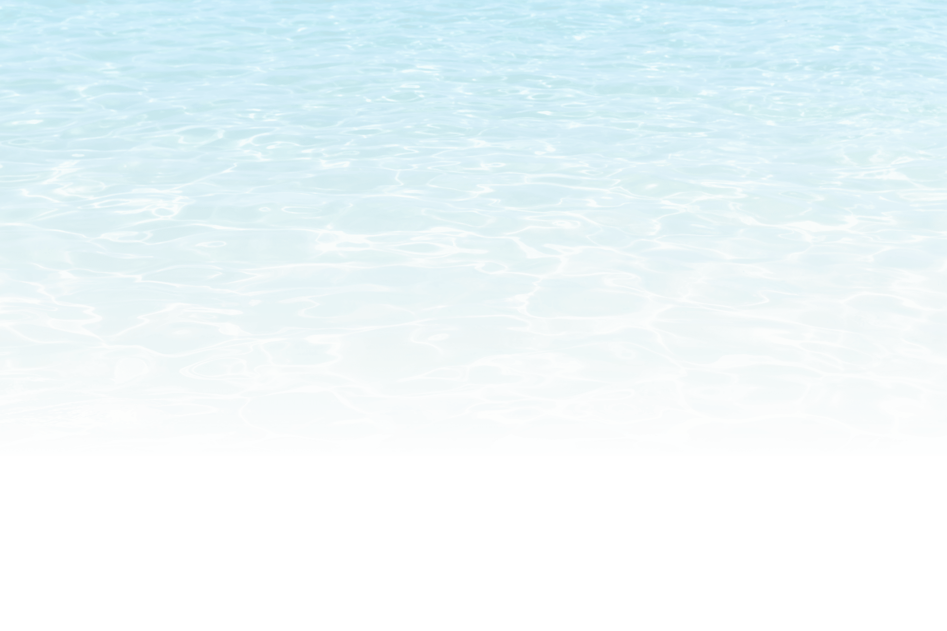 Clear turquoise water ripples gently, reflecting sunlight in intricate patterns. Calm, tranquil scene evokes a sense of serenity and natural beauty.